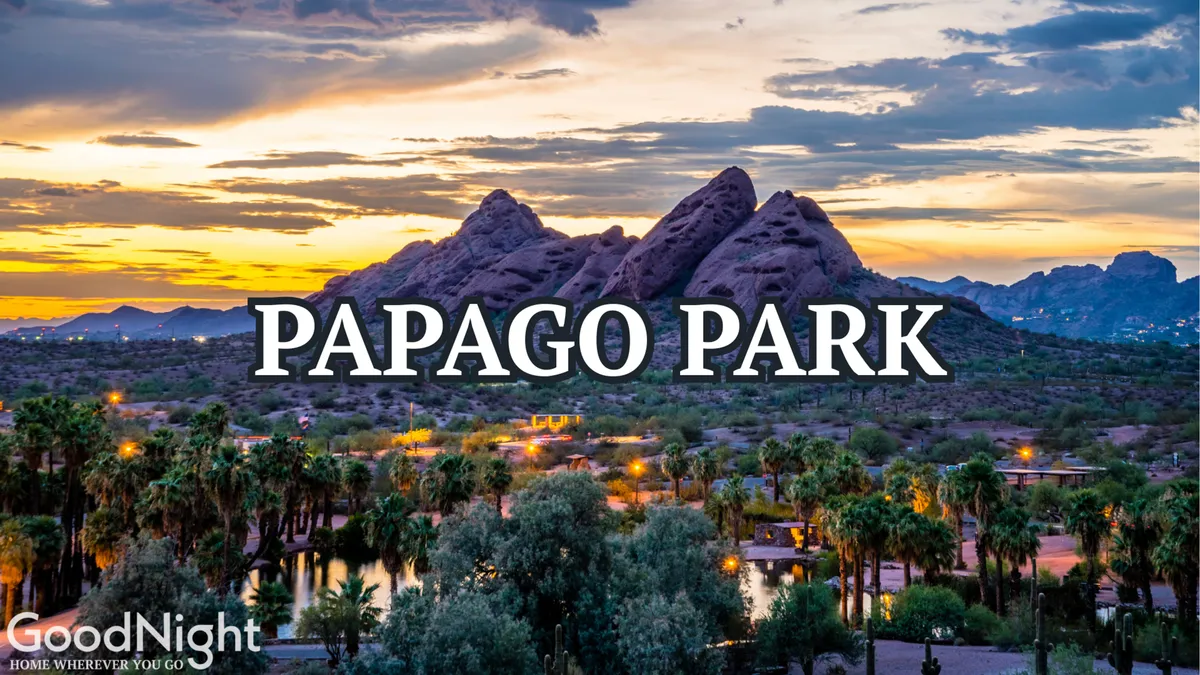 The iconic buttes of Papago Park sit beneath a colorful sky, framed by swaying palm trees and open space ideal for hiking and picnics. The image captures the park’s natural beauty and opportunities for outdoor play and exploration.